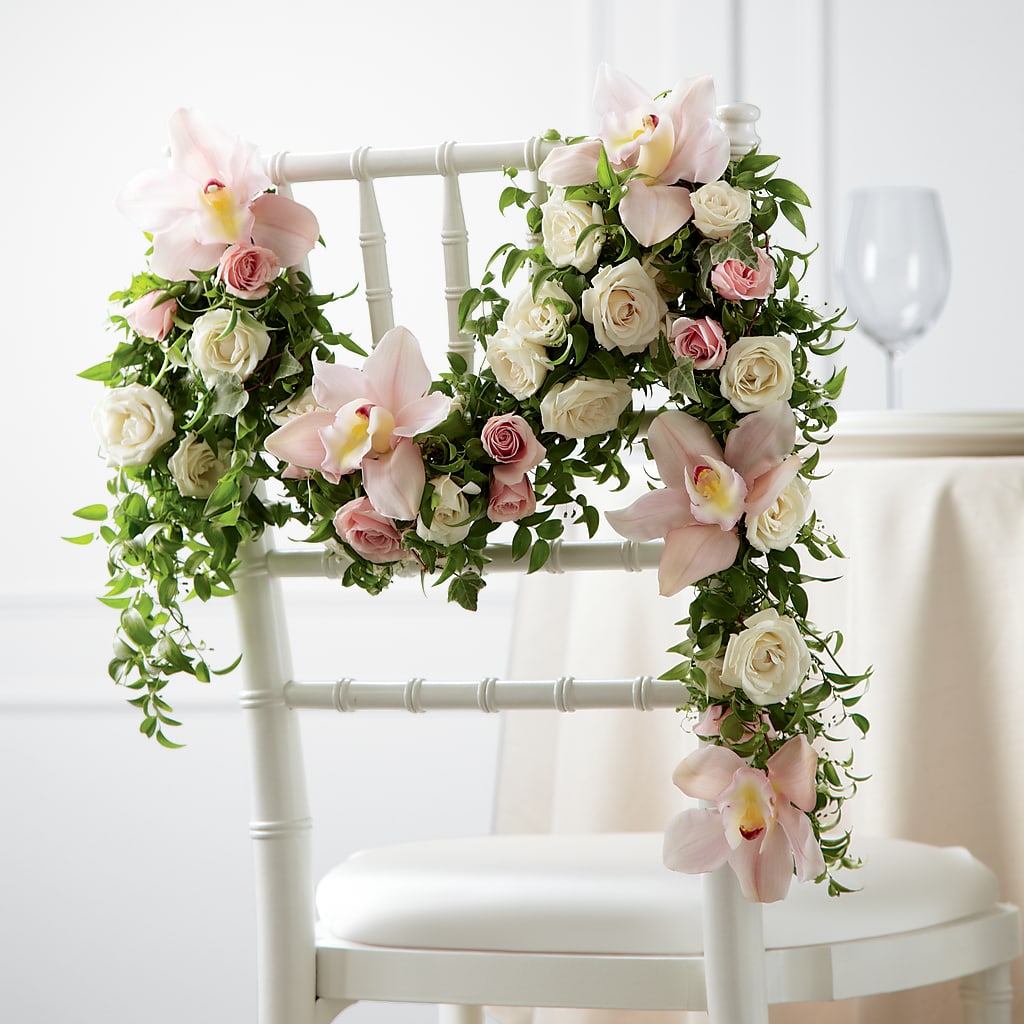 Orchid Rose Chair Décor – Genoveva Rodriguez Flower Shop, San Benito TX